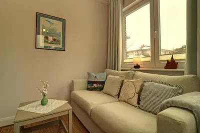 Ein Sitzbereich in der Unterkunft Villa Johanna App 1- mit zwei Balkonen & Garten - nur wenige Schritte vom Strand
