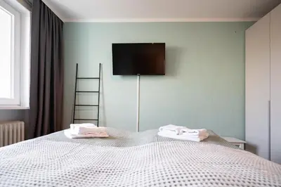 Ein Bett oder Betten in einem Zimmer der Unterkunft StrandPause 52