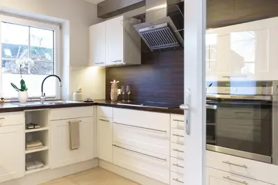Küche/Küchenzeile in der Unterkunft NEU Hütthus Ferienhaus in Timmendorfer Strand