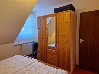 Ein Bett oder Betten in einem Zimmer der Unterkunft Fewo Sonnensee II Haffkrug Aalweg 28