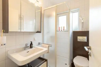 Ein Badezimmer in der Unterkunft Ferienwohnung Timmendorfer Perle