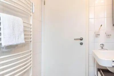 Ein Badezimmer in der Unterkunft Ferienwohnung Timmendorfer Perle