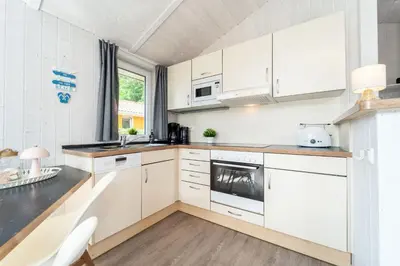 Küche/Küchenzeile in der Unterkunft Freibeuterweg - Dorf 6 Ferienhaus 14