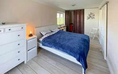 Ein Bett oder Betten in einem Zimmer der Unterkunft Amazing Home In Timmendorfer Strand Ot