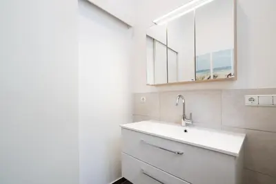 Ein Badezimmer in der Unterkunft Strandperle No 22