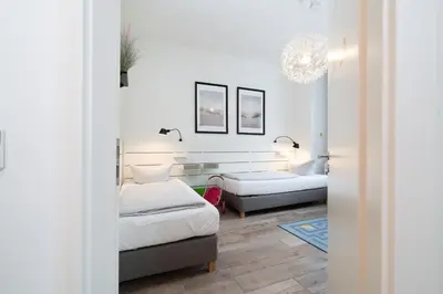 Ein Bett oder Betten in einem Zimmer der Unterkunft Strandperle No 22