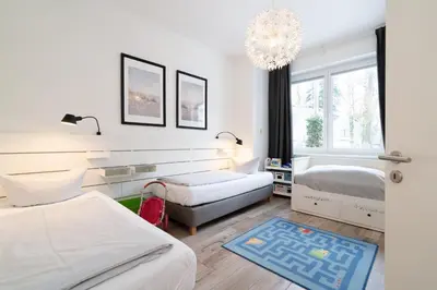 Ein Bett oder Betten in einem Zimmer der Unterkunft Strandperle No 22