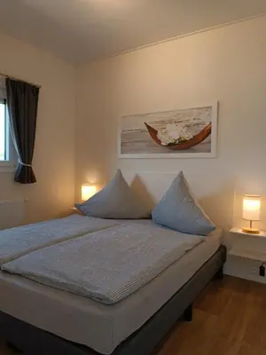 Ein Bett oder Betten in einem Zimmer der Unterkunft Black Pearl