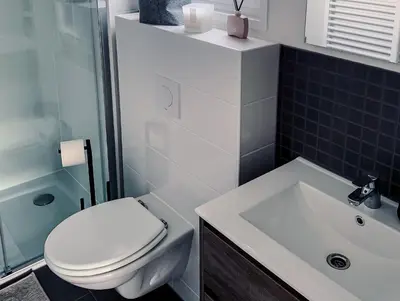 Ein Badezimmer in der Unterkunft Süsel Seeparx Ferienhaus Seehütte 25