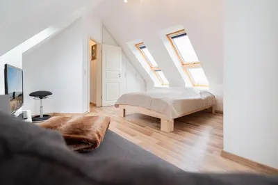 Ein Bett oder Betten in einem Zimmer der Unterkunft Hanseatenresidenz App 31