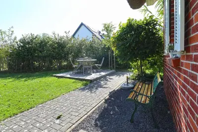 Ein Garten an der Unterkunft Meerzeit Doppelhaushälfte
