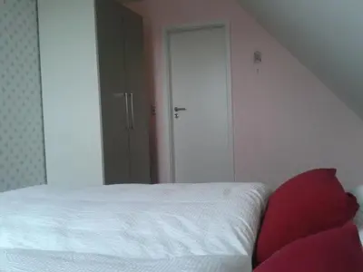 Ein Bett oder Betten in einem Zimmer der Unterkunft Apartment 4 by Interhome