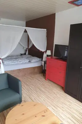 Ein Bett oder Betten in einem Zimmer der Unterkunft Apartment FeWo Hein ! Da sein by Interhome
