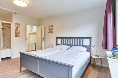 Ein Bett oder Betten in einem Zimmer der Unterkunft Haus SeeZeit Appartement 03