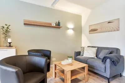 Ein Sitzbereich in der Unterkunft Haus SeeZeit Appartement 03