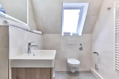 Ein Badezimmer in der Unterkunft Haus SeeZeit Appartement 08