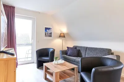 Ein Sitzbereich in der Unterkunft Haus SeeZeit Appartement 07