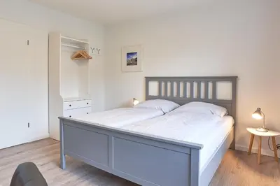 Ein Bett oder Betten in einem Zimmer der Unterkunft Haus SeeZeit Appartement 06