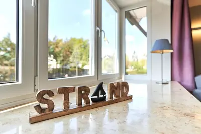 Ein Zertifikat, Auszeichnung, Logo oder anderes Dokument, das in der Unterkunft Haus SeeZeit Appartement 04 ausgestellt ist