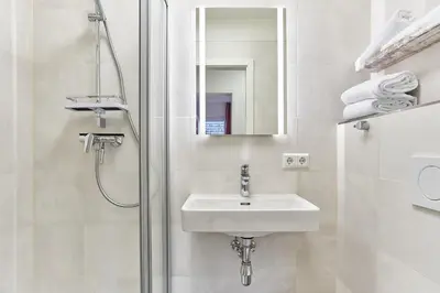 Ein Badezimmer in der Unterkunft Haus SeeZeit Appartement 05