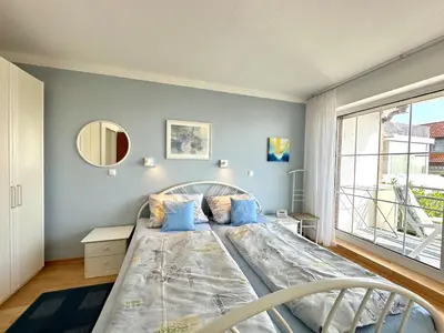Ein Bett oder Betten in einem Zimmer der Unterkunft Strandresidenz Sierksdorf Strandresidenz 1
