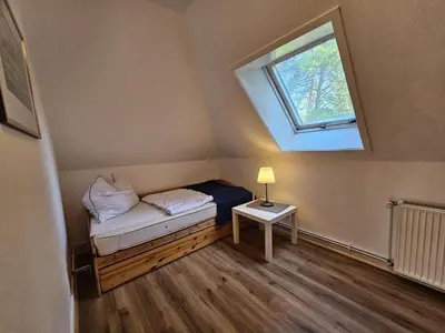 Ein Bett oder Betten in einem Zimmer der Unterkunft Ostseepanorama