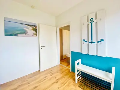 Ein Bett oder Betten in einem Zimmer der Unterkunft Tümmler
