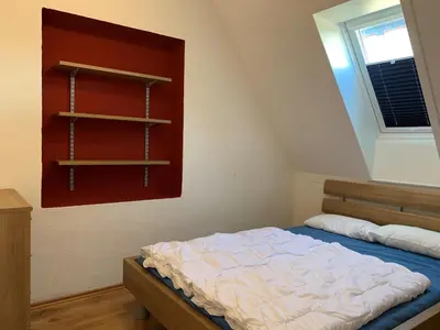 Ein Bett oder Betten in einem Zimmer der Unterkunft Robbe