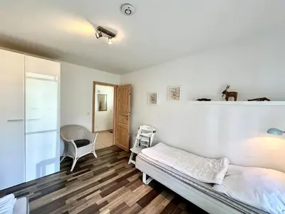 Ein Bett oder Betten in einem Zimmer der Unterkunft Strandpark Lübecker Bucht Muckla