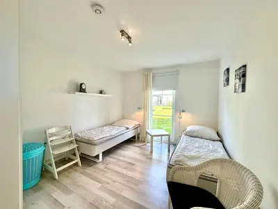 Ein Bett oder Betten in einem Zimmer der Unterkunft Strandpark Lübecker Bucht Findus