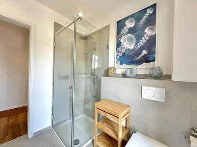 Ein Badezimmer in der Unterkunft Salt & Sand Haffkrug Salt & Sand Wohnung Sea