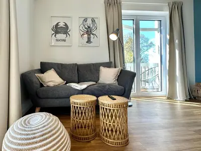 Ein Sitzbereich in der Unterkunft Salt & Sand Haffkrug Salt & Sand Wohnung Sea