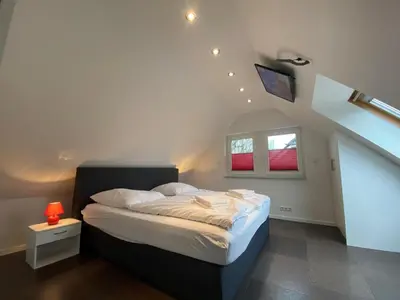 Ein Bett oder Betten in einem Zimmer der Unterkunft Flipper