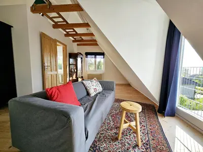 Ein Sitzbereich in der Unterkunft Haus Horizont