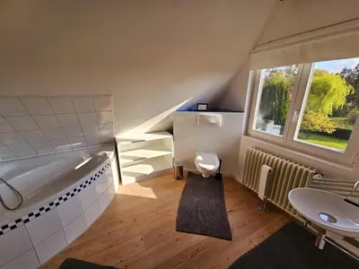 Ein Sitzbereich in der Unterkunft Haus Horizont