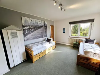 Ein Bett oder Betten in einem Zimmer der Unterkunft Haus Horizont
