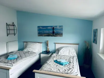 Ein Bett oder Betten in einem Zimmer der Unterkunft House 4seasons Scharbeutz