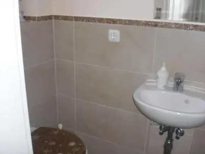 Ein Badezimmer in der Unterkunft House 4seasons Scharbeutz