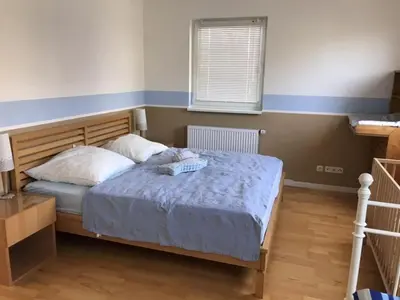 Ein Bett oder Betten in einem Zimmer der Unterkunft House 4seasons Scharbeutz