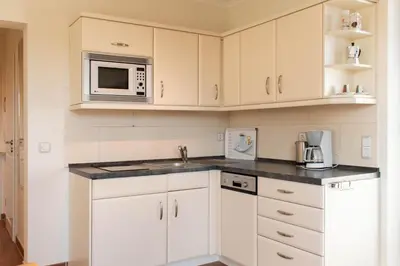 Küche/Küchenzeile in der Unterkunft Moderne Kurparkresidenz Whg. 12