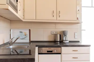 Küche/Küchenzeile in der Unterkunft Moderne Kurparkresidenz Whg. 12