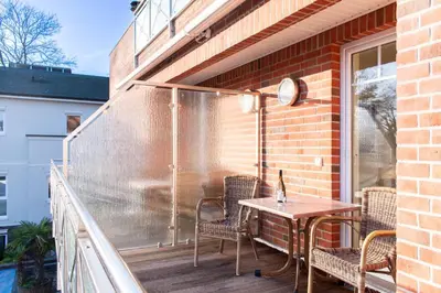 Ein Balkon oder eine Terrasse in der Unterkunft Moderne Kurparkresidenz Whg. 12