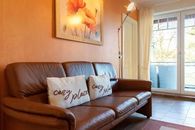 Ein Sitzbereich in der Unterkunft Ferienwohnung Moderne Kurparkresidenz Whg. 9