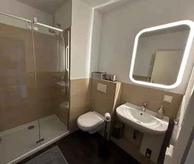 Ein Badezimmer in der Unterkunft Poststrasse 2