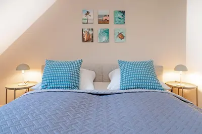 Ein Bett oder Betten in einem Zimmer der Unterkunft Strandgut 25