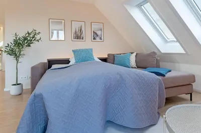 Ein Bett oder Betten in einem Zimmer der Unterkunft Strandgut 25