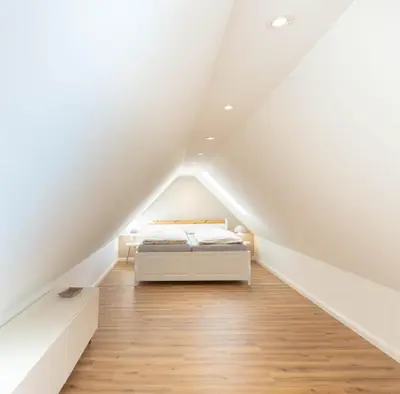 Ein Bett oder Betten in einem Zimmer der Unterkunft Ferienwohnung Lütt Strandhuus - Scharbeutz