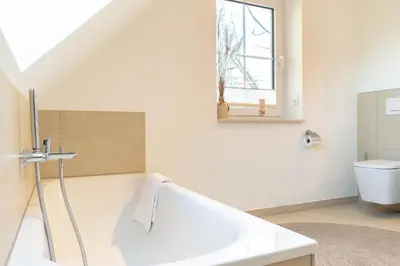 Ein Badezimmer in der Unterkunft Ferienwohnung Lütt Strandhuus - Scharbeutz