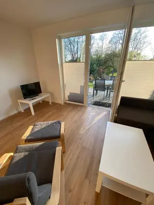 Ein Sitzbereich in der Unterkunft Ferienhaus Wesloer Landstraße 6b