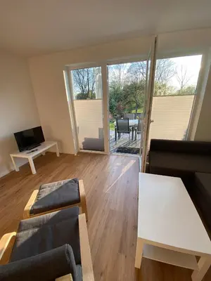 Ein Sitzbereich in der Unterkunft Ferienhaus Wesloer Landstraße 6b